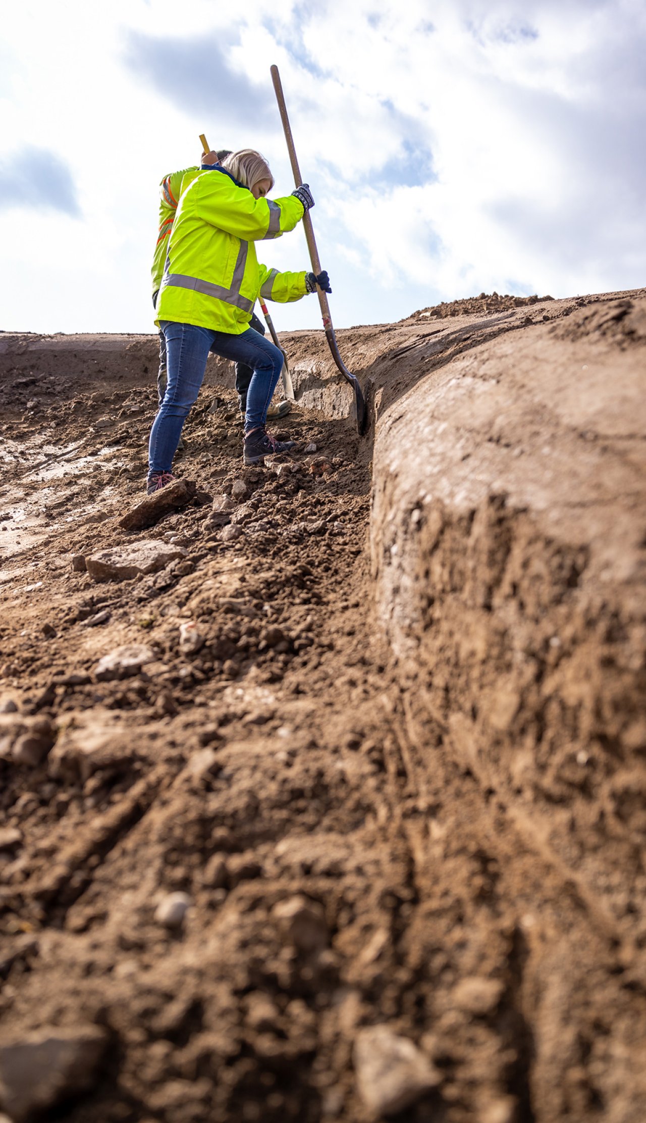 Worker digging.